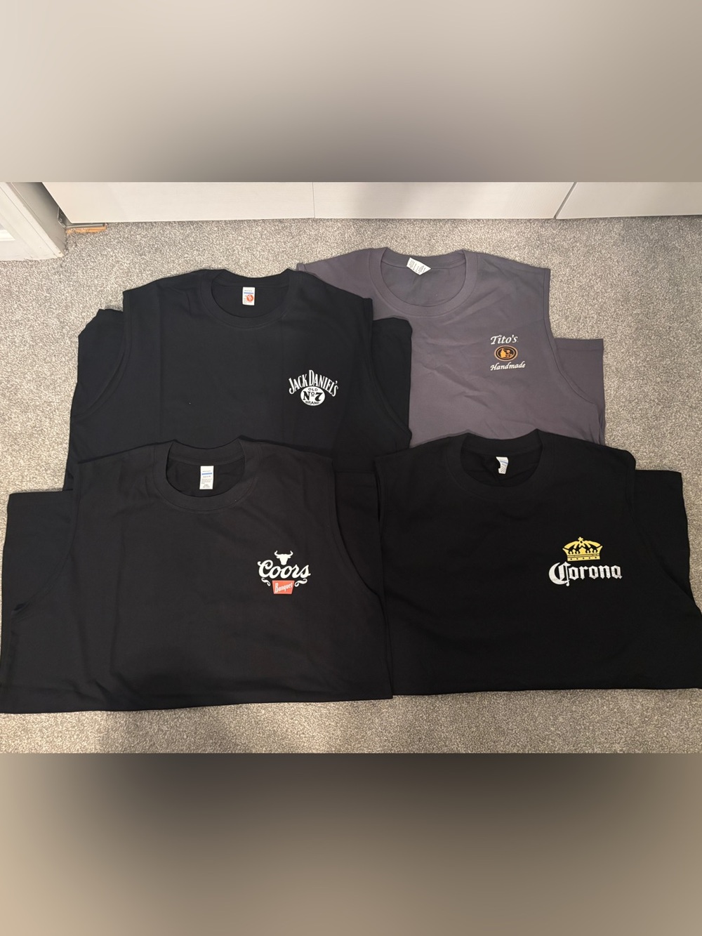Lot of 4 Men’s Branded Logo Sleeveless T-Shirts